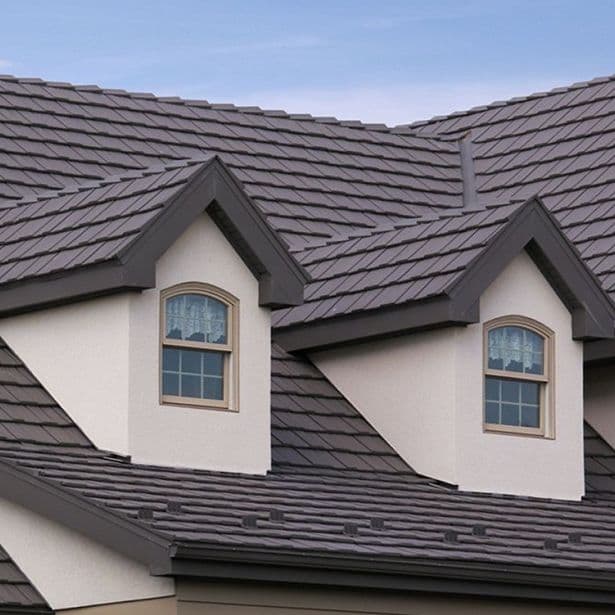 Roofing Team Working on a House